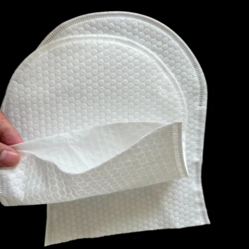 Laminated Nonwoven Bath Glove close up view by weston